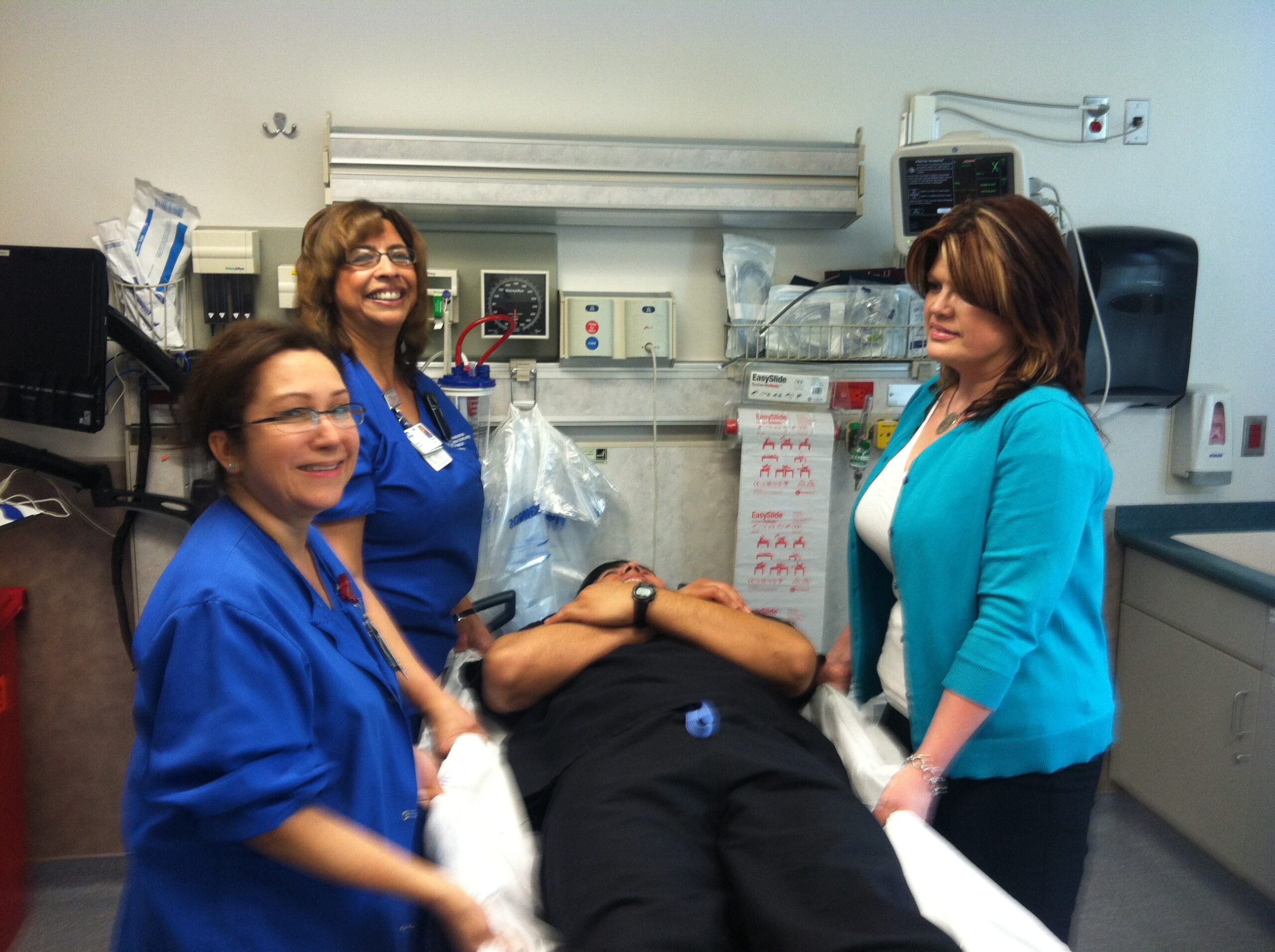 EasySlide Disposable Low Friction Slide Sheets in action with nurses and therapy staff