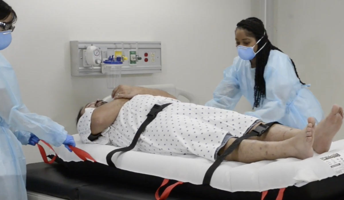 Two caregivers can easily reposition or transfer a patient